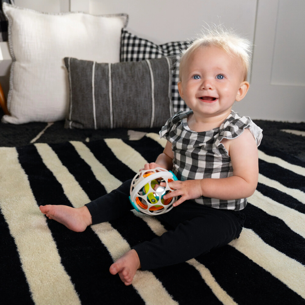 Minge zornaitoare Baby Einstein Oball Grip & Spin